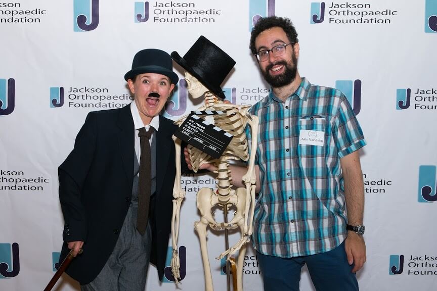 Charlie Chaplin lookalike poses with gala guest